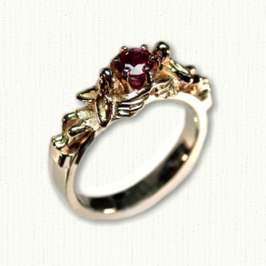 14Kt white gold 'Angel'engagement ring set with a 5mm round garnet.