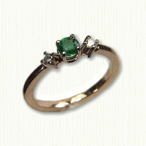 14Kt yellow gold 'April' set with a .33ct round emerald and two .05ct round diamonds.