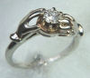 Item# CD19: Unique 14kt  White gold engagement ring set with RBC diamond.