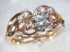 Item# CD6: 14kt yellow gold hand made engagement/wedding set with hand carved 14kt rose gold roses.