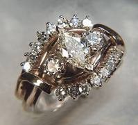 14kt yellow gold band set with three small diamonds.