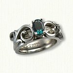 Platinum Floral Scroll Reverse Cradle set with a 0.76ct Oval Alexandrite. Platinum inner wedding band.