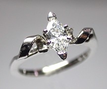 14Kt white gold 'Lisa' set with a .51ct marquise cut diamond.